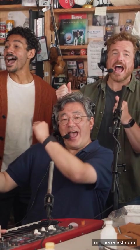 Generated keyboard player and two backing singers in the studio at 0.9 seconds.